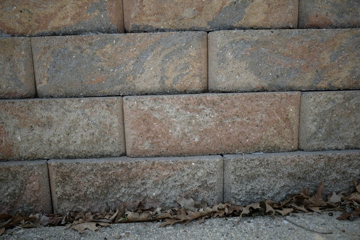 Close detail of an interlocking block retaining wall